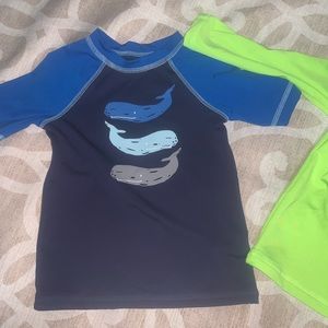 2T swim shirts. Selling together
